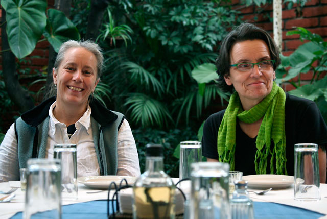 Sue Messer and Max White sitting on a restaurant patio.