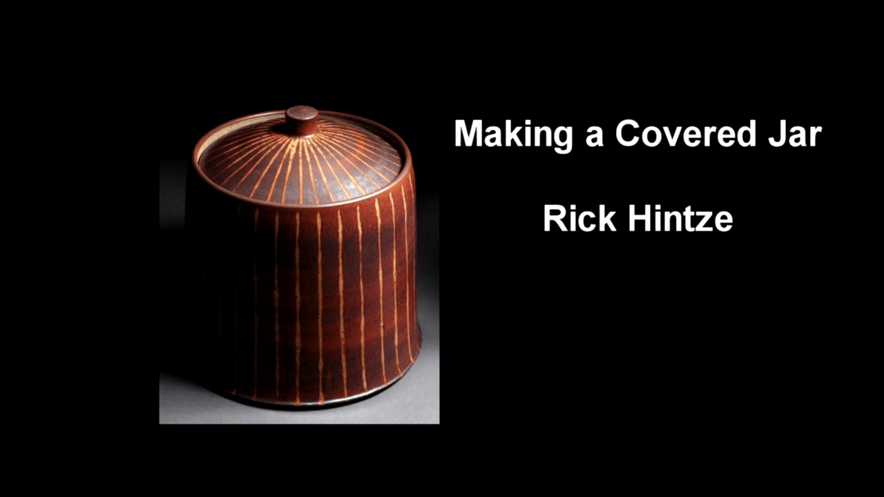 Ceramic Jar with Top on a black background