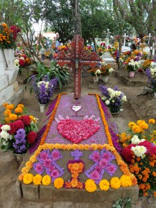 Marigolds and other flowers decorate a grave site at San Antonín.