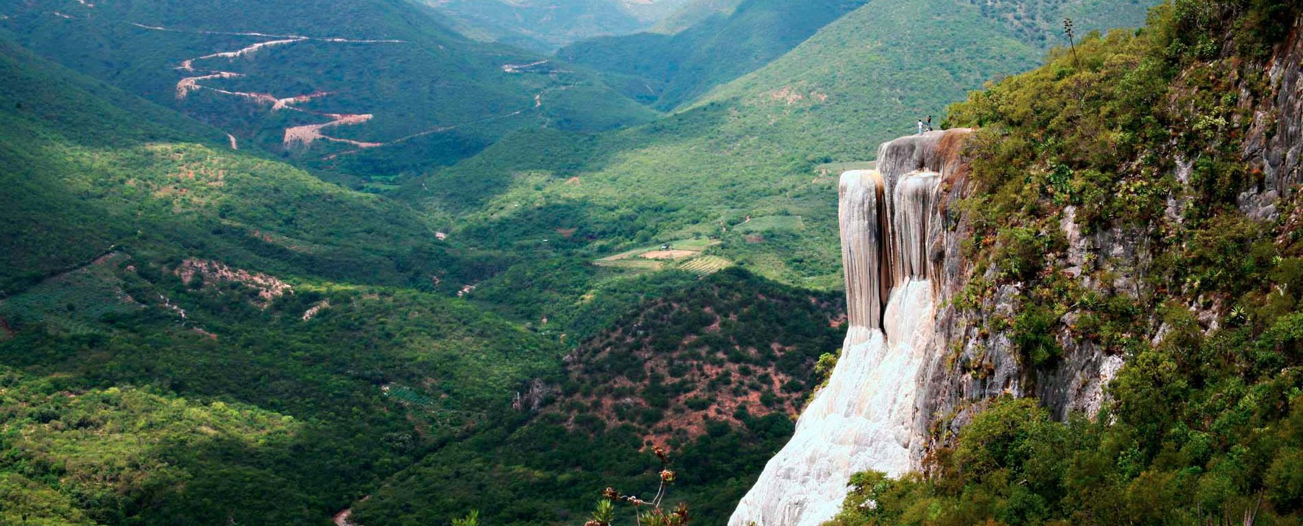 View of cliffs of calcified rock and surrounding valley