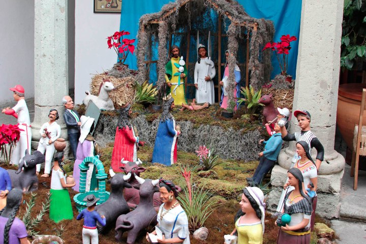 Nativity scene with three kings and other guests