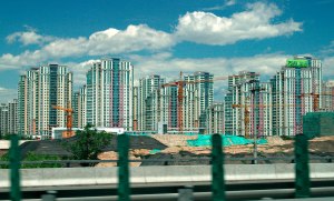 A large high-rise apartment complex construction site.